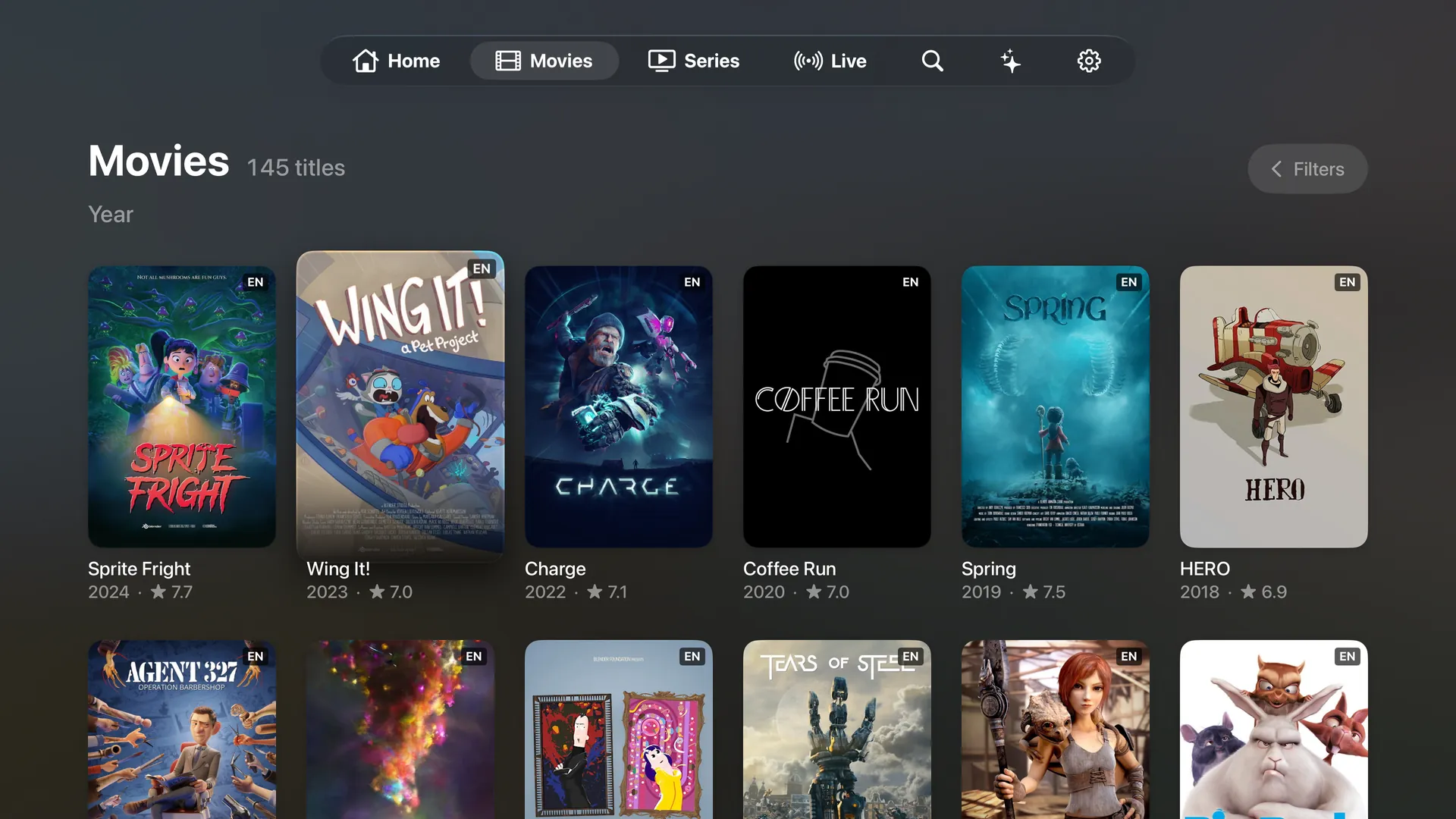 The Movies grid sorted by year, with posters for Sprite Fright, Wing It!, Charge, Coffee Run, Spring and HERO